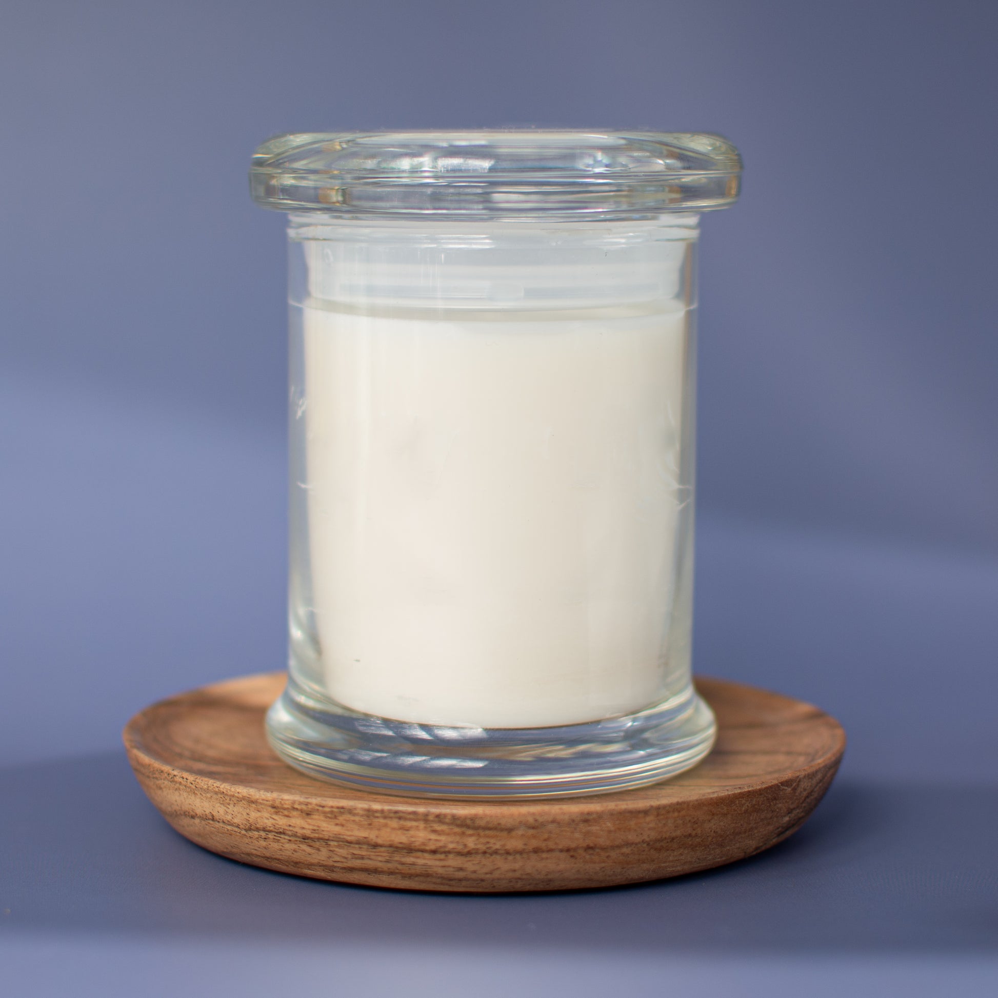 The Naples unscented candle in clear glass vessel with glass lid, made in USA by Unscented Candle Company