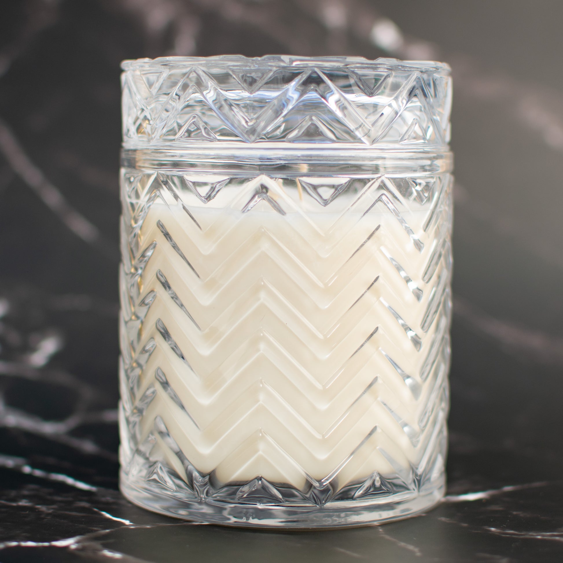 The Paris fragrance free soy candle on marble surface by Unscented Candle Company
