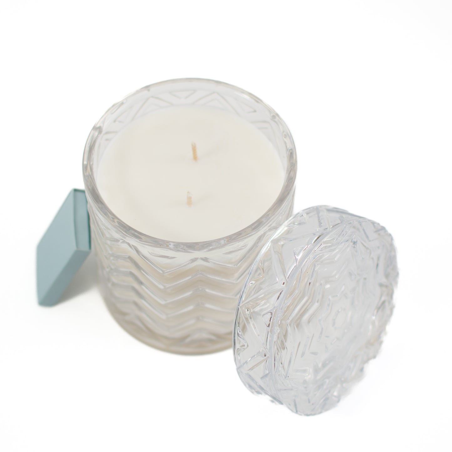 Top view of The Paris fragrance free candle on white background 