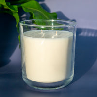 The sun shining on the Stockholm unscented soy candle with double wick